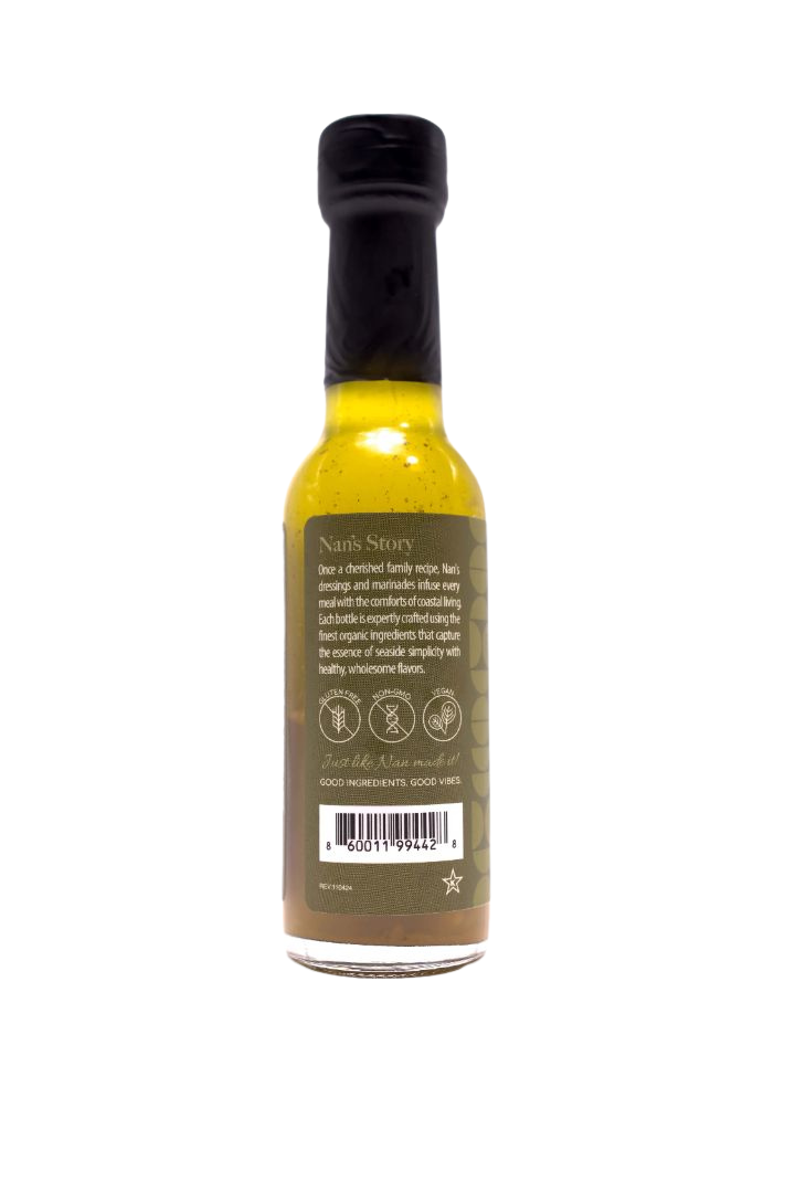 mini bottle of Nan's lala garlic vinaigrette mini 5 oz bottle on a white background