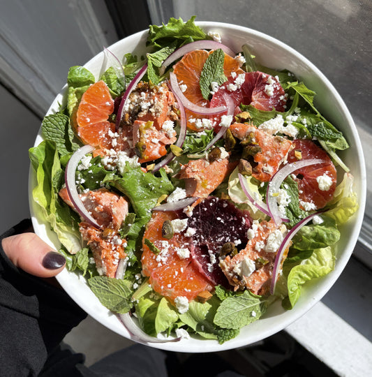 Pistachio-crusted salmon served over a citrus salad with butter lettuce, blood oranges, feta, mint, and Nan’s Harbor Maple Dijon Vinaigrette.